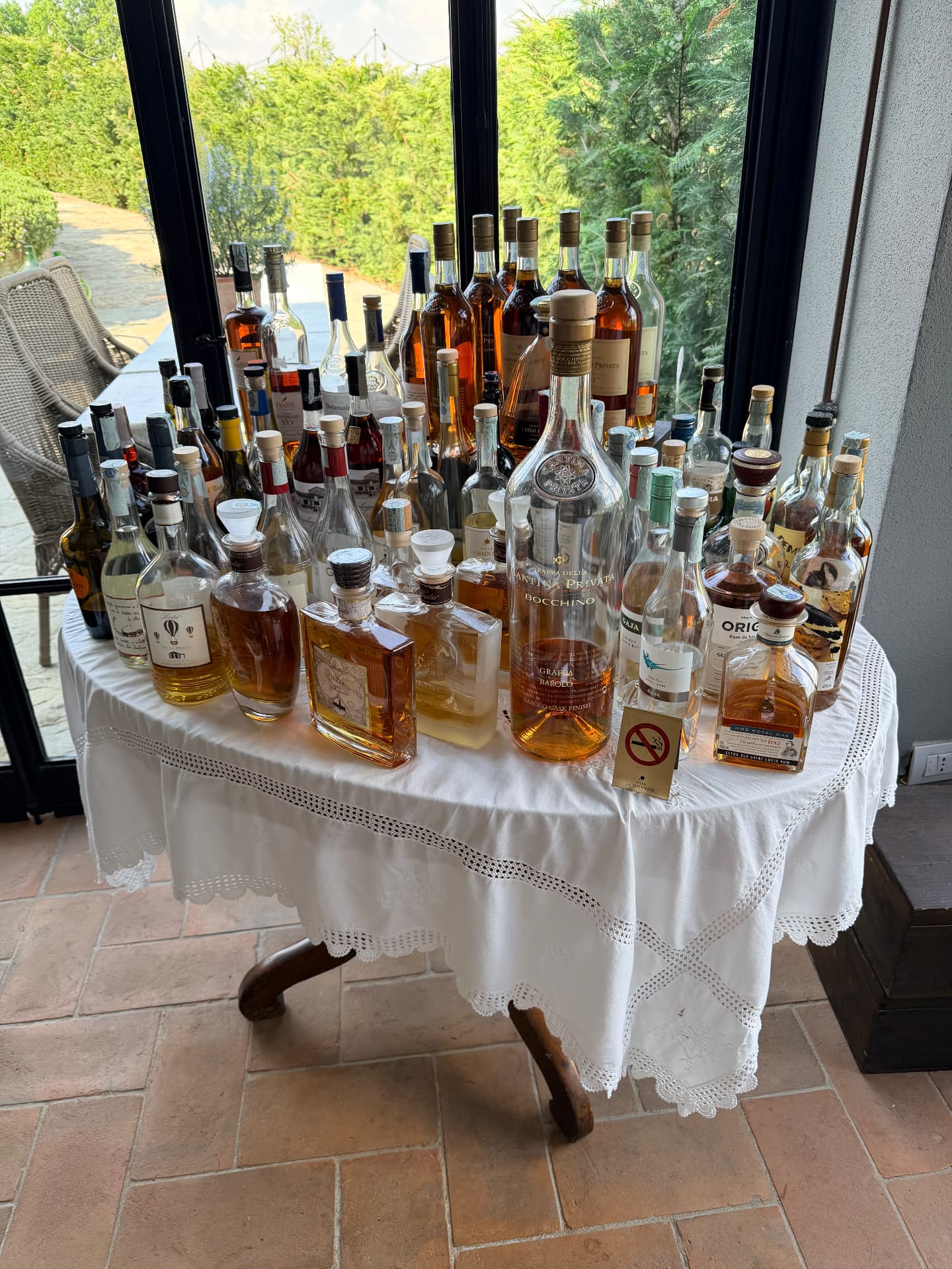 A table of grappa and spirits at a villa in Italy