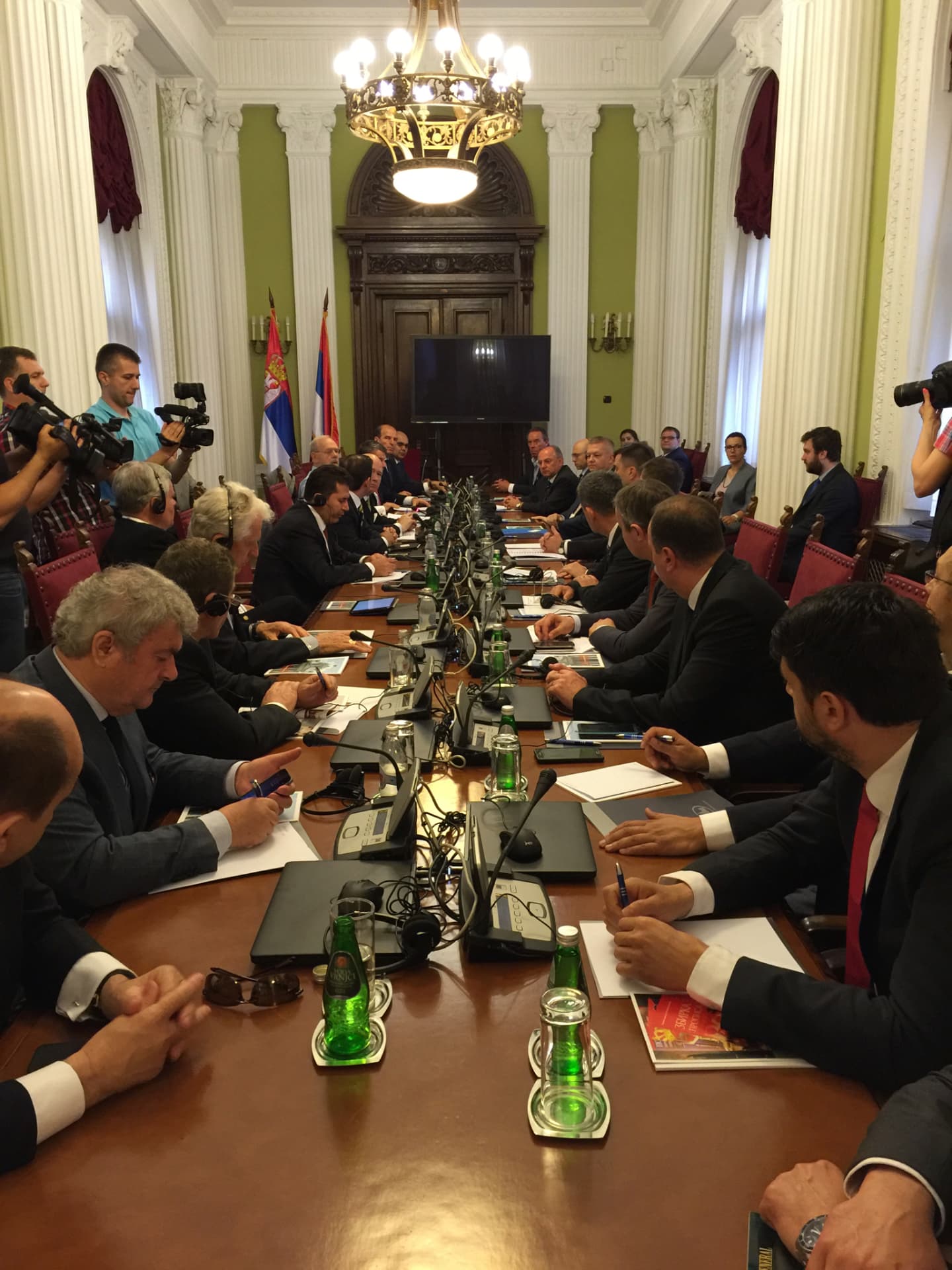 A parliamentary council convened around a long table